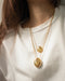 Layer on statement sculptural pendants for maximum impact - Gaia and Pebble Necklace by The Hexad