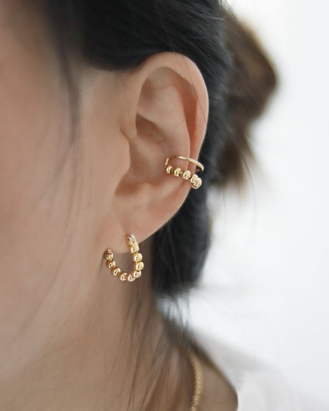 Layer the beaded hoop earrings with the beaded ear cuffs for a layered look @thehexad