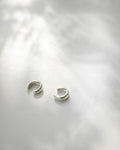 Minimalist round ear cuffs in silver - The Hexad