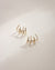 Modern illusion hoop earrings in gold by the hexad