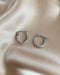 Petite silver hoops in 15mm diameter that is great for layering - The Hexad Jewelry