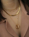Promise ring necklace layered with gold chains - The Hexad