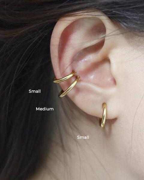 Retractable ear cuffs worn as a fake conch piercing - available in 3 sizes by The Hexad