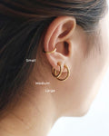 Retractable hoops worn on the ear lobes and as a ear cuff - The Hexad
