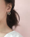 Silver hoops in small and medium for layering - The Hexad
