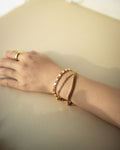 Simple stacking bracelets in gold - The Hexad Jewellery