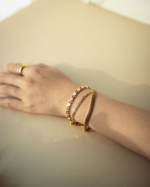 Simple stacking bracelets in gold - The Hexad Jewellery