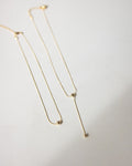 Sleek ball chain necklace in gold by The Hexad Jewelry