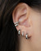 Suzi hoops layered in silver ear stack @Thehexad