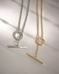 The Hexad Lexi toggle necklace featuring simple elegant  aesthetics of a bar and circle clasp