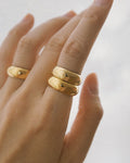 TheHexad's gold affirmation ring stack