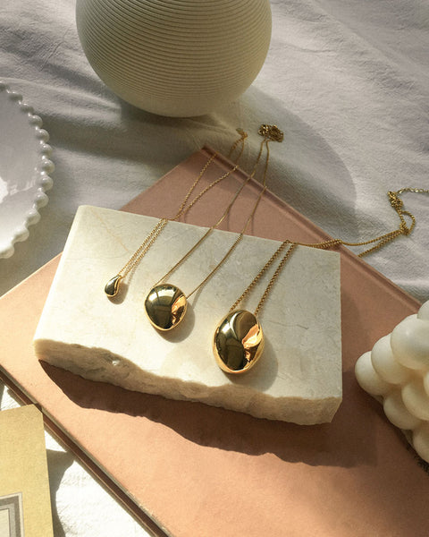 The Hexad's Teardrop, Pebble and Gaia Necklace in Gold