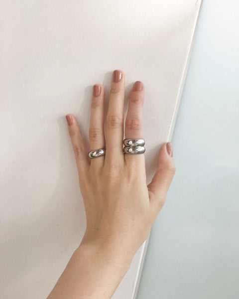 Thick chunky silver rings layered together - The Hexad