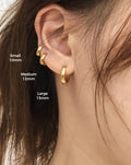 Tiny bold gold hoops perfect for multiple ear piercings - The Hexad.jpg
