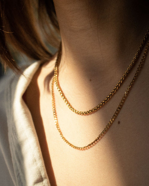 Trendy layered wheat and curb chain necklaces in gold by THE HEXAD