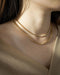 Versatile gold chain featuring tiny interlocking square shape links - Script necklace by The Hexad