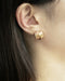 Vintage style ear studs designed by The Hexad