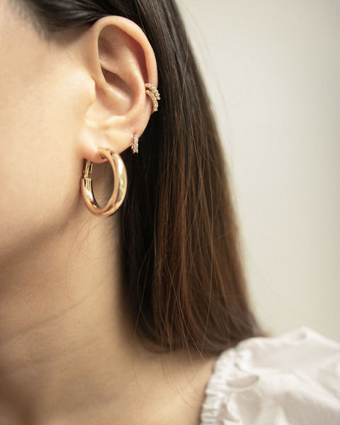 Wearing golden hoop earrings of multiple sizes on same ear - The Hexad