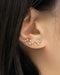 attractive ear stack consisting asymmetrical bee and honeycomb stud earrings with the magical like fairy dust studs