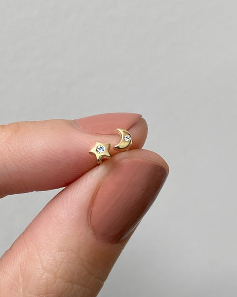 barely there stud earrings in star and moon shapes @thehexad