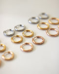 basic huggie hoop earrings in silver, gold and rose gold