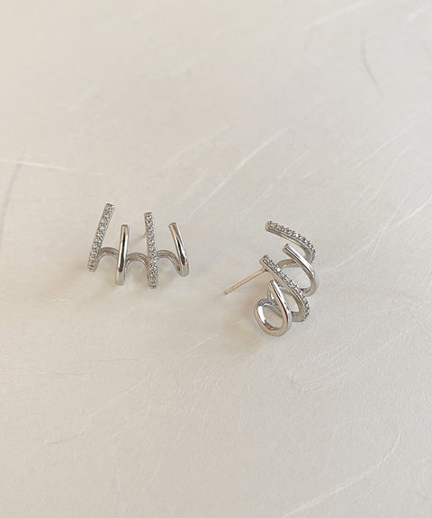 bestselling illusion four claw earrings now launched in silver on the hexad