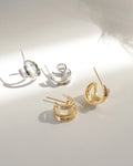 brand new atlantis hoop earrings in gold and silver from the hexad