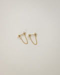 cable chain and ball drop style sud earrings in gold by the hexad