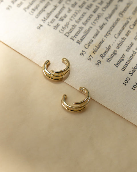 casual gold ear cuffs with a triple band design