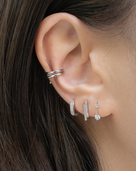 chic silver ear party inspiration comprising pixie huggie hoop and micro stud earrings from popular instagram brandthe hexad