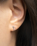 chic tulip bloom stud earring with single leaf diamond by the hexad