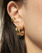 chunky gold stack with the bold rei hoops and thick cleopatra ear cuffs from the hexad