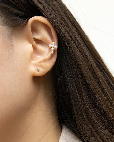 classy feminine ear stack with pearl ear cuff and tiny heart stud earring