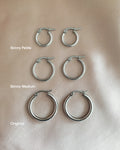comparison of the hexad skinny silver rei hoops and our classic original rei hoops