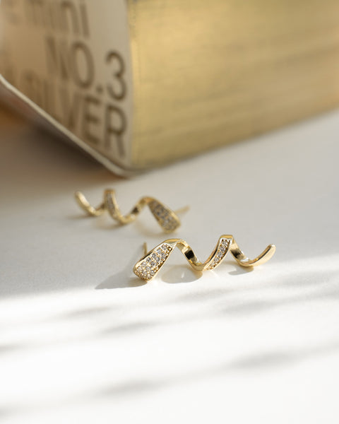 contemporary helix inspired earrings adorned with diamante