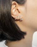 create a brilliant ear stack with diamond stud earrings and ear cuffs from the hexad