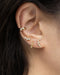 curated ear stack with the hexad's micro stud earrings and huggie hoops
