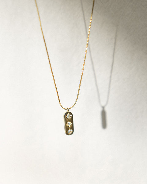 dainty chain necklace with pretty pendant embellished with diamonds