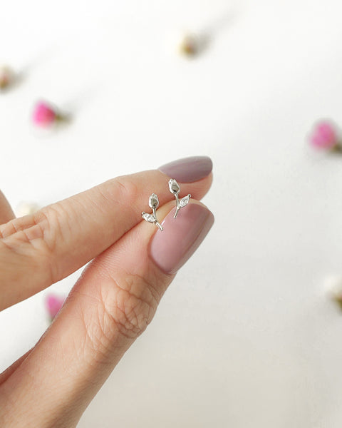 dainty micro stud earrings in tulip bud shape