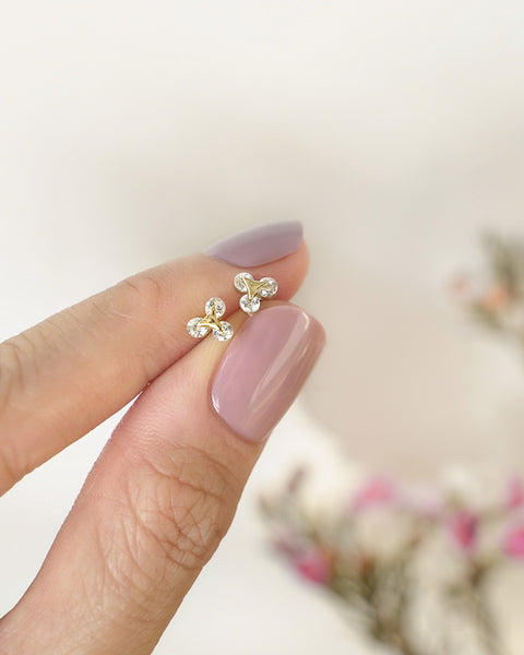 dainty stud earrings featuring trinity of circle diamonds from the hexad