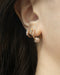 dangly circus charms huggie earrings in rose gold