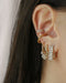 diamond ear stack with sparkly dazed earrings and moonshine ear cuffs from The Hexad