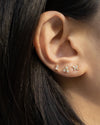 delicate mini stud earrings crafted with sparkly diamonds by the hexad