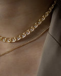 details of the floating rhinestones in the trance chain choker in gold