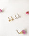 eve baguette stud earrings in gold and silver from modern jewelry label the hexad