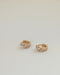 everyday huggie earrings with ornate flower design and fine diamante details