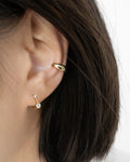 exude subtle sophistication in the pixie huggie hoop layered with the hexad best selling cult ear cuff