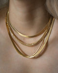 fashion ideas on how to create a trendy neck mess with contemporary cobra chain necklaces