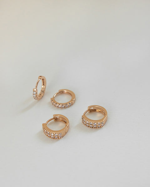 flattering huggie earrings with a choice of single and double tiers of diamonds for a charming look