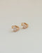 flattering huggie hoop earrings with floral star cut diamonds by the hexad